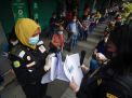 FOTO: Vaksinasi Covid-19 Masal Pedagang Pasar Genteng