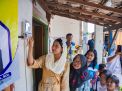 Ratusan Warga di Gresik Dapat Bantuan Pasang Baru Listrik, Anggota DPR: Dulu Gelap, Sekarang Terang