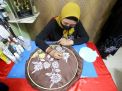 Berkah Lebaran, UMKM di Surabaya Panen Orderan Jilbab dan Masker Lukis