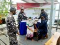 Momen HUT TNI AL ke-76, Posal Kumai Gelar Ops Vaksinasi Covid-19 pada Warga Desa Sungai Kapitan